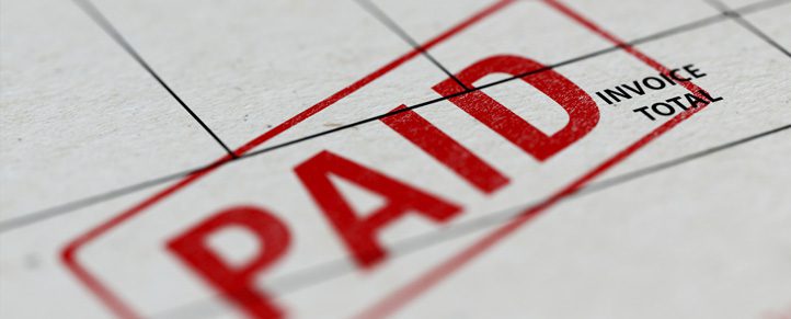 Invoice stamped with "Paid" in red ink.